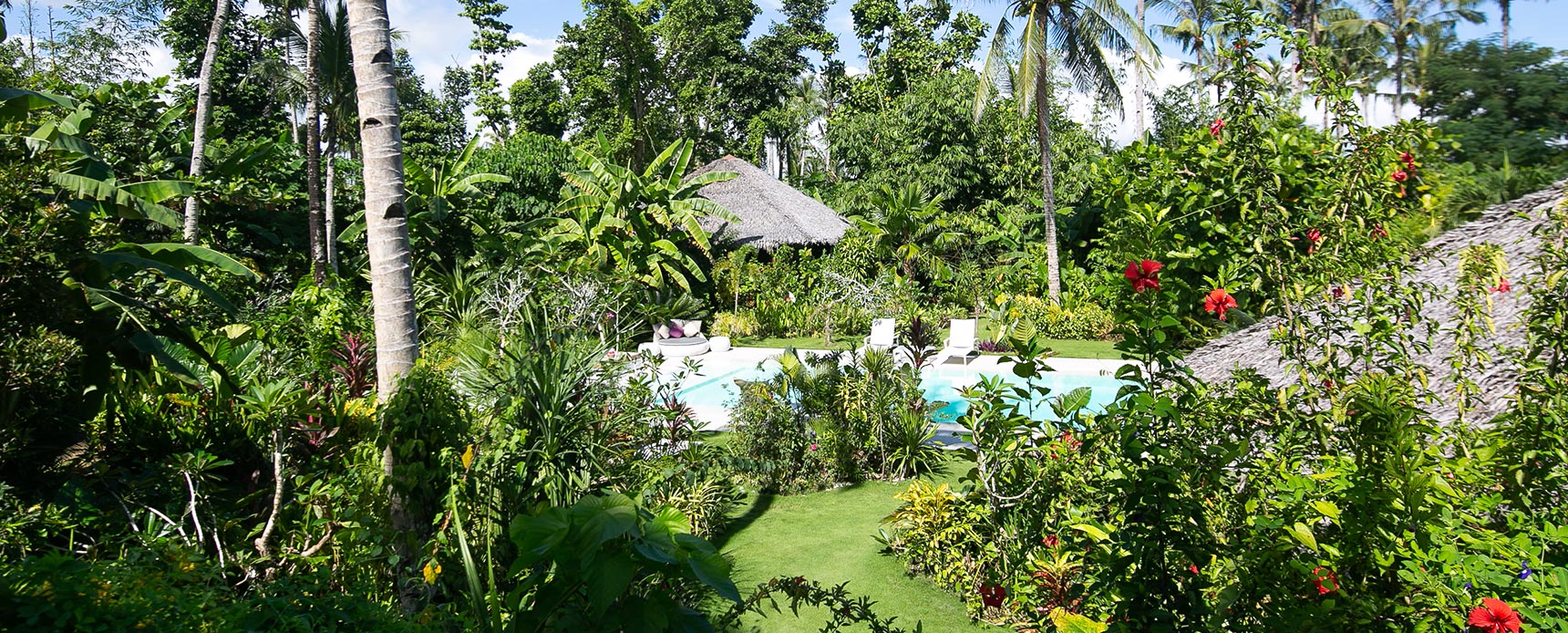 Pool and garden at dusk — Kawayan Villa Siargao luxury villa, Cloud 9 Siargao