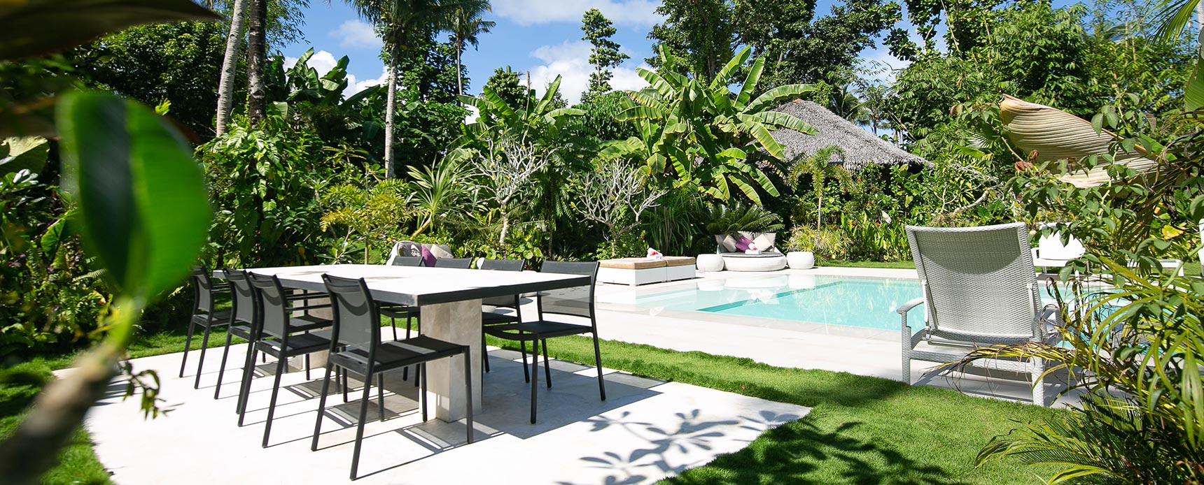 Kawayan Villa Siargao pool side seating area — Cloud 9, Siargao