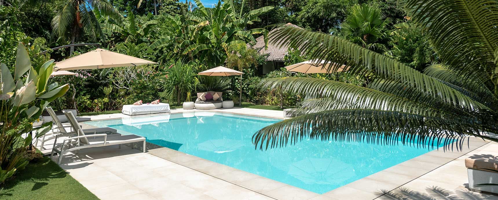 Private pool and tropical garden at Kawayan Villa — family surf retreat base in Siargao