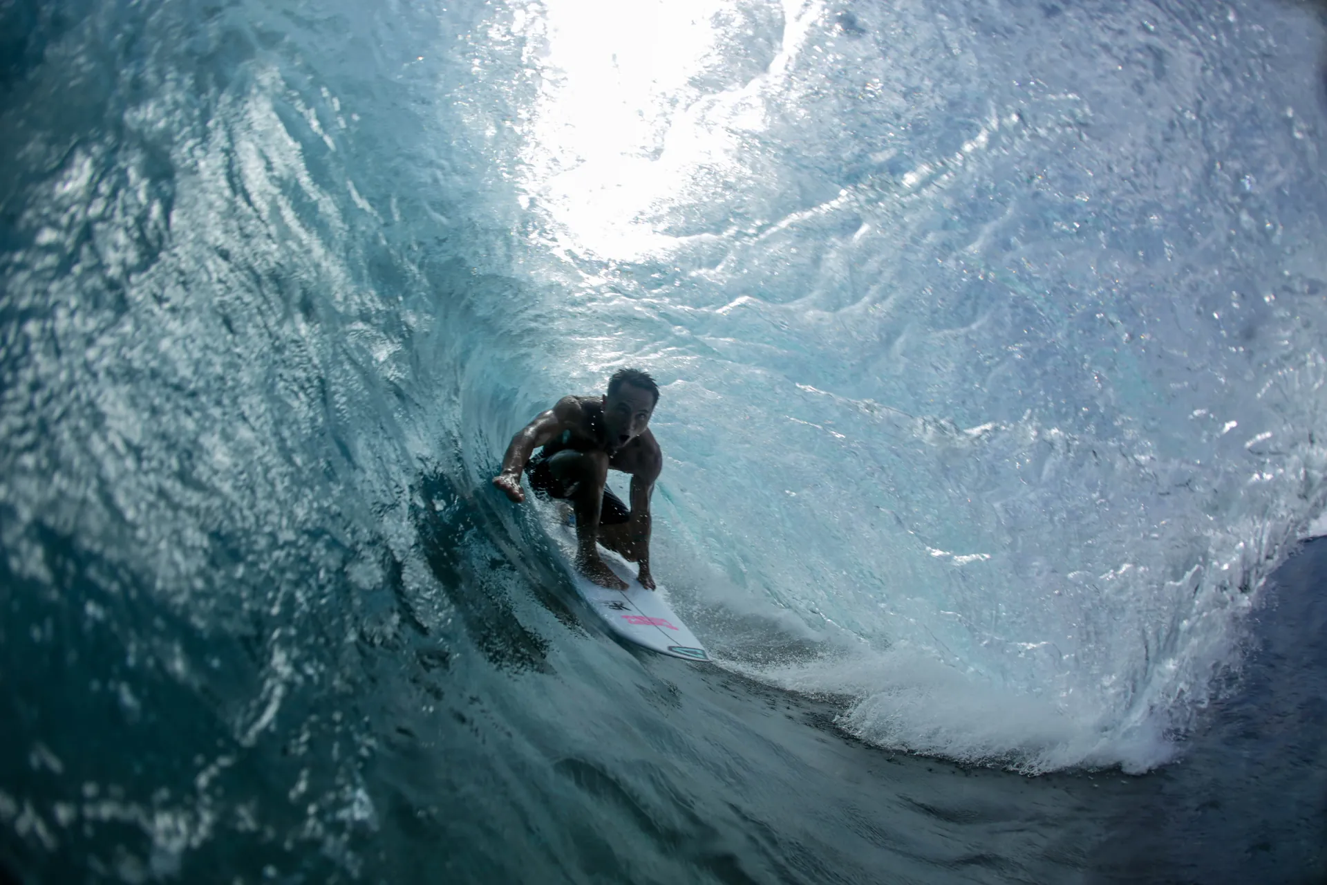 Inside the barrel at Cloud 9 Siargao — surf coaching at Kawayan Villa