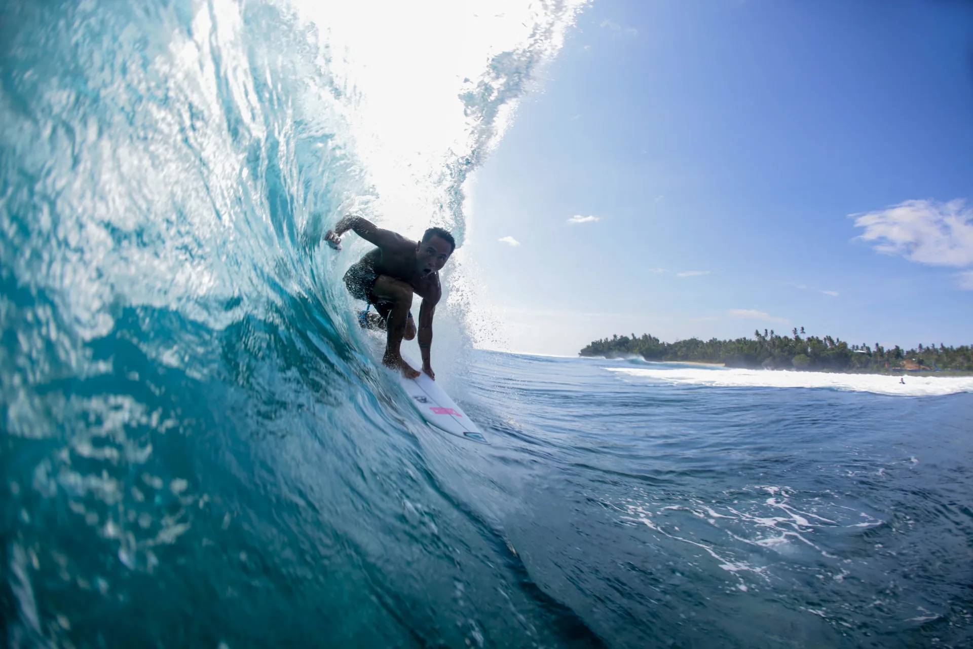 Bottom turn at Cloud 9, Siargao's famous right-hand reef break