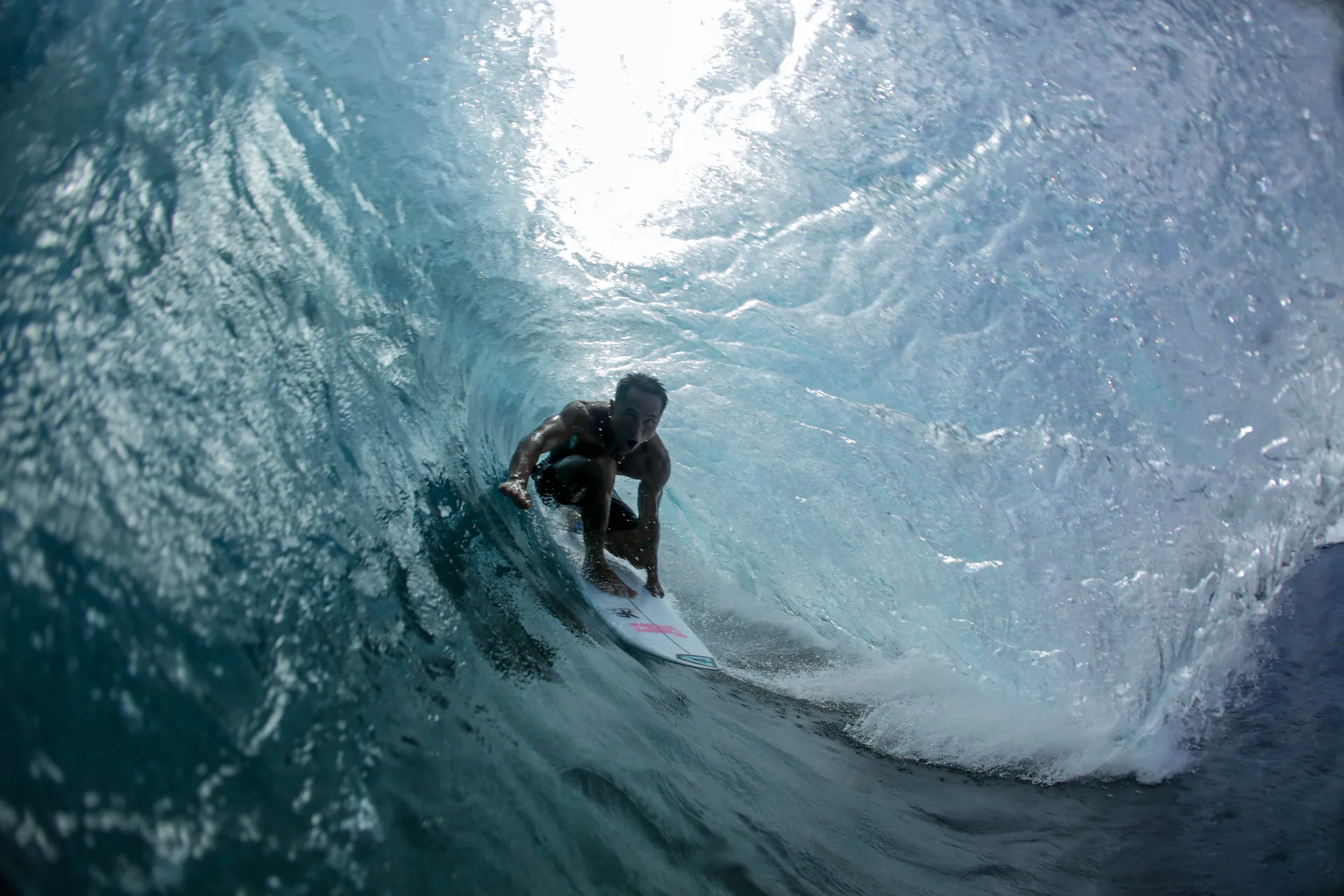 Backlit barrel at the Cloud 9 surf break, Siargao